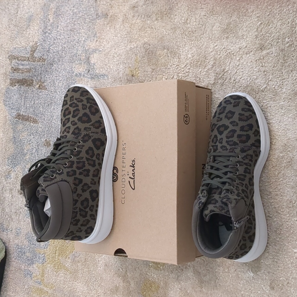 Never worn women's olive green animal print mid tops